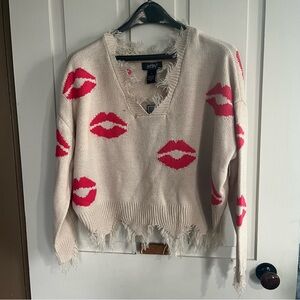 Distressed V-Neck Sweater with Pink Lips